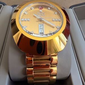 Rado Gold Watch with Day Display